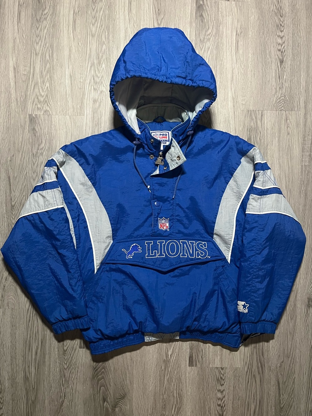 Vintage 90s STARTER Detroit Lions NFL football pullover winter hooded jacket L